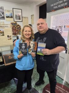 Author Lisa Traugott with Leonard Low at the Scottish Witch Trial Museum in Fife.